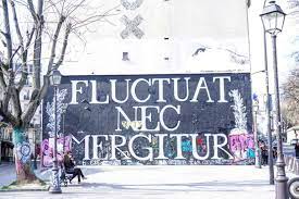 Looking up from our table at the reopening, i saw those words again and wondered about their meaning. What Is The Meaning Of Fluctuat Nec Mergitur Parisian Motto Solosophie