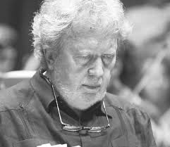 Actually, there is a photo of opera composer John Urich. John Urich was  born in Trinidad in 1849 and first lived with his parents in London. He was  a student of the