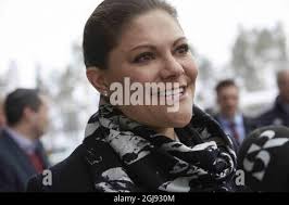 OSTERSUND 2015-03-04 Crown Princess Victoria and Prince Daniel along with  player of Ostersund football