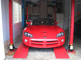 ©2019 courtesy of rm sotheby's. 7000 Lb Backyard Buddy Lift Installed In A Westchester Ny Garage Lifted Cars Residential Garage Installation