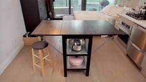 Locate your kitchen island seating well away from your island's hob, if applicable, and prep spaces to keep little fingers safely away from hot pans and sharp knives. Diy Kitchen Island With Folding Tabletop Buy Or Diy Crafty Decor Projects You Can Create Hgtv