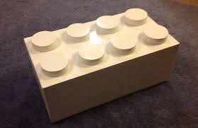 These 2 trays are perfect for containing lego bricks and even better at sliding away under the sofa at the end of the day. Give Quirky Touch To Living Room With Jumbo Lego Brick Coffee Table