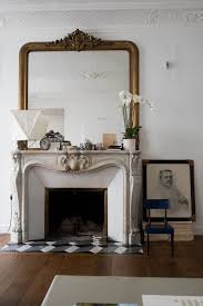 Well Designed Family Friendly Stay In Paris House Of Valentina Black Fireplace Antique Fireplace Mantle Minimalist Decor