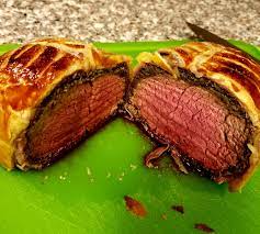 First attempt beef Wellington! 129° for 1.5hrs, baked 300° for 30mins. Full  disclosure, many many steps in between... : r/sousvide