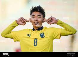 Korawich Tasa of Thailand celebrates a goal during the AFC U23 Asian Cup  Uzbekistan 2022 Group J qualifying round between Thailand and Laos at the  MFF Stadium. (Final score; Thailand 3:0 Laos Stock Photo - Alamy