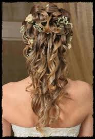 Flowers tucked within the braided bun with neat and elegant. 68 Elegant Half Up Half Down Hairstyles That You Will Love