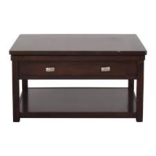 Upon the far right of the room, there is a great deal of window seating to enjoy. 35 Off Ashley Furniture Ashley Furniture Hatsuko Lift Top Cocktail Table Tables