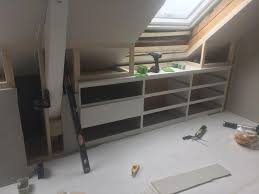 But here is what we ve got going so far thanks to building in a few pieces of ikea storage. This Loft Storage Hack Is Anything But Ordinary Loft Storage Attic Bedroom Storage Loft Storage Ideas