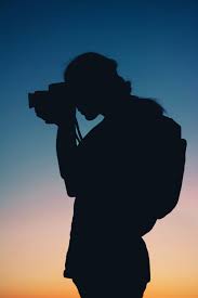 Maybe you would like to learn more about one of these? Silhouette Of Person Taking Photo With Camera Free Stock Photo