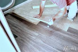 High end plank, not the cheap stuff. Four Reasons To Use Luxury Vinyl Tile Flooring In Your Home Refined Rooms