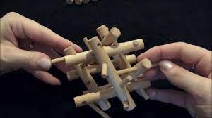 If it's treated as a ball and tossed about, i imagine it would break easily enough. Tri Frame Puzzle Solution Tutorial Wooden Brain Teaser Bamboo Puzzle 3d Pegs Sticks Youtube