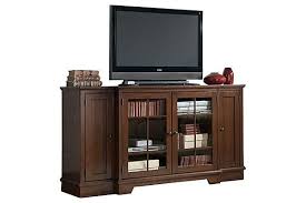 The Hodgenville Tall Extra Large Tv Stand From Ashley Furniture Homestore Afhs Com With The Deep Large Tv Stands Corner Tv Cabinets Tv Stand Brown