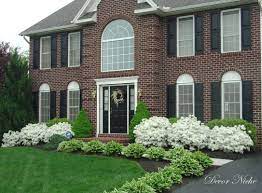 It's a great shrub for front yards, she adds of its formal look. Beautiful Front House Landscaping Front Yard Landscaping Design Front Door Landscaping