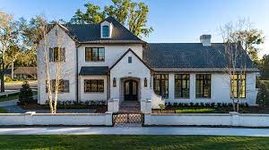 French country houses are a special type of european architecture defined by sophisticated brick stone and stucco exteriors beautiful multi paned windows and prominent roofs in either the hip or mansard style. French Country Style Home Design Home Bunch Interior Design Ideas