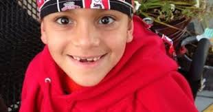 Hempfield boy who underwent emergency brain surgery gets a special visit  from Philadelphia Eagle Michael Vick