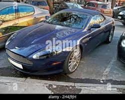 Image result for Midnight Blue 2011 Aston Martin