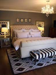 I Love The Mirrors Behind Each Lamp This Would Be A Perfect Way To Light And Open Up A Basement Guest Room Small Master Bedroom Home Bedroom Bedroom Makeover