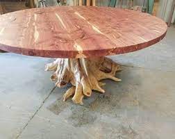 With a tapered design and distinctive crossed feet, the white cedar round coffee table channels mid century style. Bed Frame Cedar Bed Post Bed Custom Made Frame Cedar Etsy Wood Table Design Large Round Dining Table Rustic Coffee Tables