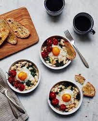 Baked Eggs With White Beans Roasted Tomatoes The Jewels Of New York Brunch Recipes Healthy Recipes Cooking Recipes