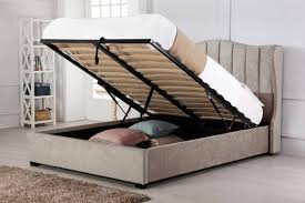 An ottoman bed is a bed which lifts up from the base to reveal an abundance of storage space beneath. Hallaton Stone Fabric Ottoman Double Bed Narborough Beds