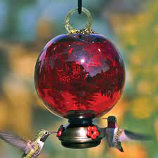 These make great gifts for people who love to garden or who enjoy hand crafted lawn ornaments. Red Dew Drop Glass Hummingbird Feeder Yard Envy