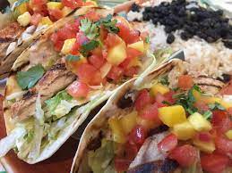 Cook 4 minutes on each side or until fish flakes easily when tested with a fork or until desired degree of doneness. Fish Tacos From Margaritaville In San Antonio Yummmm Fish Tacos Food San Antonio Restaurants