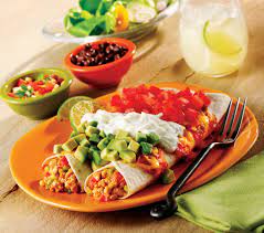 The whole family loves these easy chicken enchiladas! Mexican Flag Enchiladas Gold N Plump