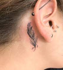Feathers come from birds, and birds rule the skies. Love It Did It Today Behind Ear Tattoo Small Feather Tattoo Behind Ear Jewelry Tattoo