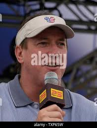 Jim Kelly, former quarterback for the Buffalo Bills, cheers after receiving  his NFL blazer during the Pro Football Hall of Fame Mayor's Breakfast at  the Civic Center in Canton, Ohio, Friday, Aug.