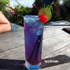 Watch Us Make The Purple Alluring Baby Https Www Youtube Com Watch V Yta 1fkav 0 Fruit Tingle Vodka Blue Cur Fruit Tingle Cocktail Fancy Drinks Bar Drinks