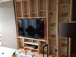 If you want the tv as flush as possible to the wall i would recommend using a fixed wall mount. Flush Mount Track To Slide Cabinet Panel Up And Down Google Search Tv Wall Living Room Remodel Wall Mounted Tv