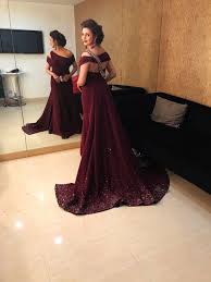 Etiquette says you should never wear red to a wedding after you've sent off your reply, the focus turns to your ensemble for the ceremony. Beautiful Back Red Carpet Evening Gown In Wine Colour Party Wear Indian Dresses Designer Dresses Wine Colored Dresses