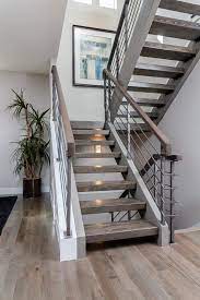 Custom Floating Stair Case With Hardwood Treads And A Metal Rail What A Dramatic Way To Make A Statement Modern Staircase Modern Stairs Contemporary Stairs