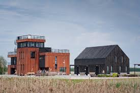 Making a water well pump house can come in many designs; Baka Lighthouse Saals Architects Transform An Old Pump Station Into A Water Tourism Center In Latvia