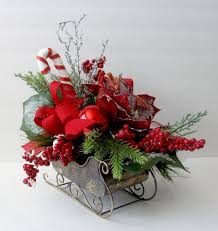 Christmas Centerpiece In Sleigh Holiday Table Decor Christmas Sleigh Arrangement Fl Christmas Flower Arrangements Holiday Decor Christmas Christmas Flowers