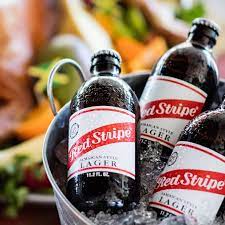 Red Stripe Beer Buckets The Original Island Brew Ice Cold And Ready To Party Five Bottles Included In Each Buck Beer Bucket Beer Photography Drinking Beer