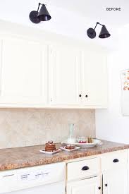 Using a roller on this procedure will make the task a lot easier and faster. Rachel Schultz Covering Laminate Counters With White Concrete