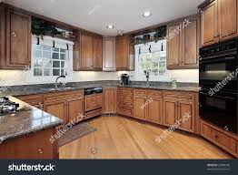 kitchen hickory cabinets stock photo