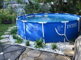 Little Old House Pool Surround In 2020 Above Ground Pool Landscaping Small Above Ground Pool Pool Landscaping