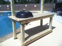A grill table provides you with the space you need to slice and dice ingredients without taking you away from your guests. Youngmenheaven Diy Weber Kettle Table