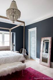 Perhaps the room that most reflects our personality is the bedroom. Master Bedroom Black Walls White Wood Bead Chandelier Whitewashed Hardwood Flooring Four Poster Bed Restpration Hardware Inkwell Rug 17 Of 19 Addison S Wonderland