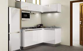 Inspiration for a modern galley light wood floor and beige floor open concept kitchen remodel with an undermount sink, natural wood kitchen cabinets, light wood cabinets, white backsplash, white marble countertops, stainless steel appliances and a peninsula. Cambodia Modern Small Lacquer Kitchen Cabinet