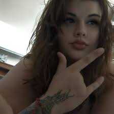 Why are some souvenir cups orange and others blue?