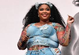 Lizzo Back On Top Of U S Charts To Tie Rap Record Drew