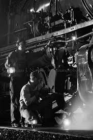 Wayne poses for the portrait session at the end of…