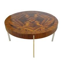 Curved walnut supports connected by a chrome bar supporting the original glass. Modernist Round Cocktail Table In Walnut And Chrome Studio Van Den Akker