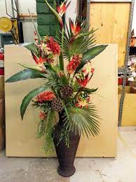 Silk flowers have one intrinsic quality that will always make them a better choice over regular flowers and that is that they never die. Large Bird Of Paradise Arrangment Tropical Floral Arrangements Tropical Flower Arrangements Large Flower Arrangements