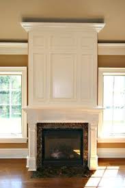 These half moon shaped arched windows are reproductions inspired by vintage cathedral windows. 230 Arch Details Fireplaces Ideas Fireplace Fireplace Design House Design