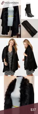 Dress Barn Open Front Faux Fur Ruana N S Feel Effortlessly Chic In This Cozy Knit Ruana Topped With A Luxurious Faux Fur Collar An Dress Barn Dresses Fashion Design Fashion Trends