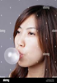 Girl chewing gum hi-res stock photography and images